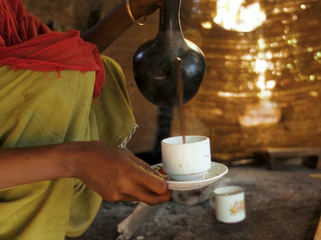 Video Reference: Hand, Drinkware, Cup, Serveware, Tableware, Drink, Tints and shades, Porcelain, Wood, Teacup