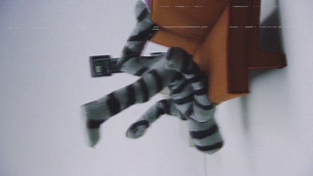 Video Reference: Toy, Sleeve, Gesture, Art, Machine, Human leg, Balance, Knee, Action figure, Carmine