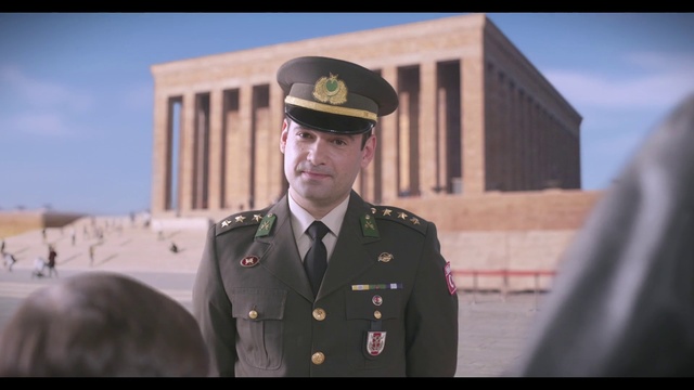 Video Reference: Sky, Military uniform, Military person, Dress shirt, Security, Tie, Gesture, Collar, Headgear, Soldier