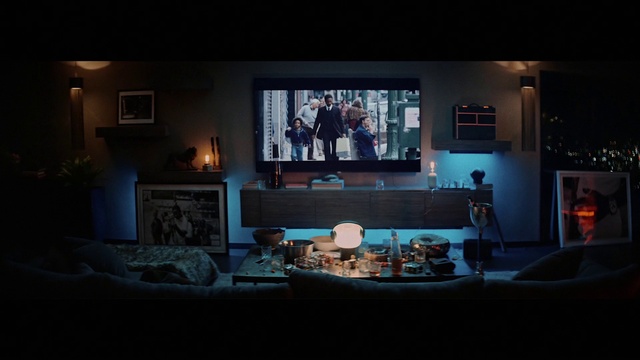 Video Reference: Property, Table, Couch, Interior design, Houseplant, Living room, Cabinetry, Television set, Coffee table, Television