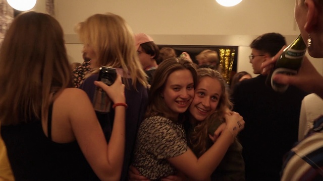 Video Reference: Hair, Organ, Smile, Flash photography, Gesture, Social group, Crowd, Fun, Eyewear, Formal wear