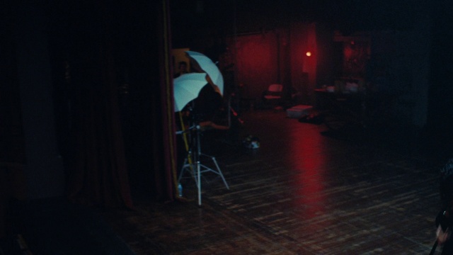 Video Reference: Tints and shades, Performing arts, Entertainment, Flooring, Event, Space, Darkness, Magenta, Umbrella, Electric blue