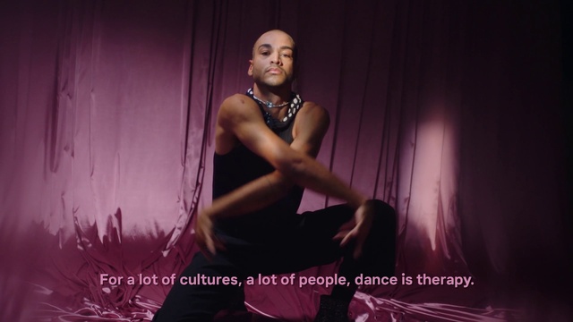 Video Reference: Purple, Flash photography, Violet, Magenta, Thigh, Fashion design, Font, Event, Darkness, Performing arts