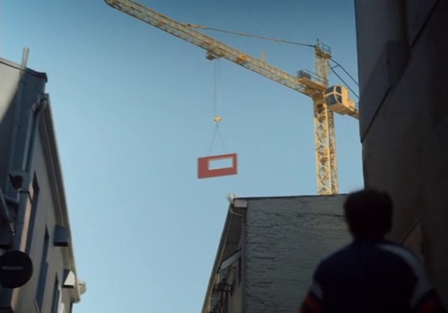 Video Reference: Sky, Building, Line, Crane, Electricity, Facade, Composite material, City, Construction equipment, Urban design