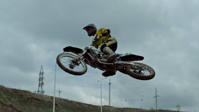 Video Reference: Sky, Wheel, Tire, Land vehicle, Helmet, Cloud, Motocross, Motorcycle, Vehicle, Enduro
