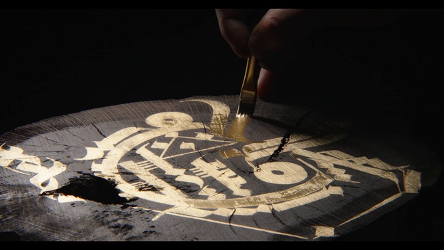 Video Reference: Wood, Font, Art, Tints and shades, Flooring, Automotive design, Circle, Graphics, Darkness, Still life photography