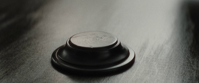 Video Reference: Font, Plastic, Fashion accessory, Metal, Circle, Macro photography, Nickel, Camera accessory, Still life photography, Currency