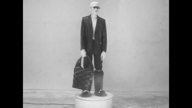 Video Reference: Leg, Human body, Sleeve, Grey, Style, Black-and-white, Collar, Tie, Flash photography, Headgear