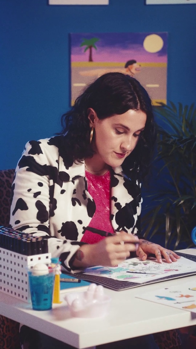 Video Reference: Blue, Coat, Adaptation, Plant, Fashion design, Fun, Event, Water bottle, Houseplant, Plastic bottle