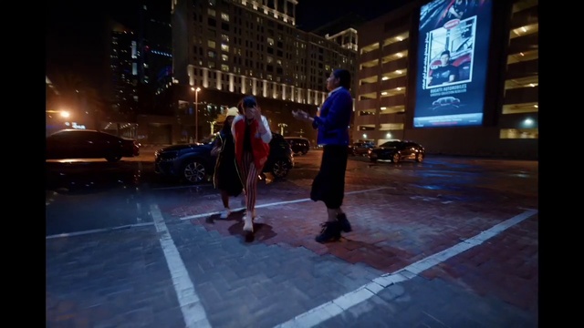 Video Reference: Automotive lighting, Car, Building, Road surface, Tire, Asphalt, Vehicle, Sidewalk, Road, Pedestrian crossing