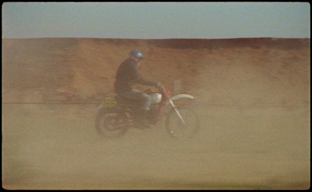 Video Reference: Tire, Wheel, Motorcycle, Automotive tire, Wood, Motor vehicle, Rectangle, Art, Tints and shades, Landscape