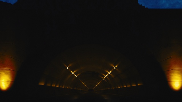 Video Reference: Amber, Electricity, Tunnel, Tints and shades, Automotive lighting, Sky, Road surface, Space, Midnight, Symmetry