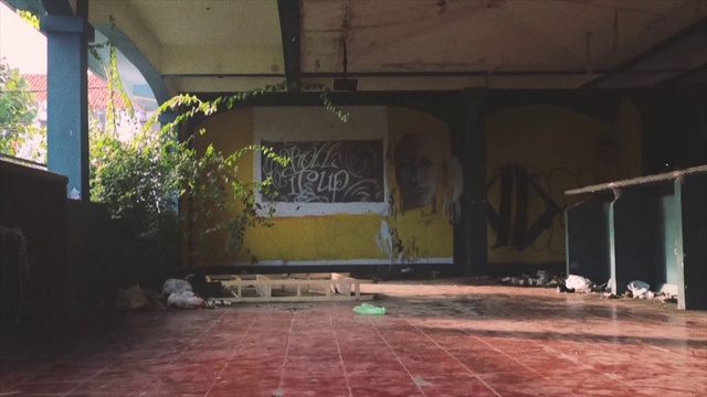 Video Reference: Art, Plant, Flooring, Tints and shades, City, Building, Graffiti, Event, Road, Visual arts