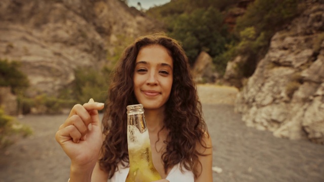 Video Reference: Smile, Hairstyle, People in nature, Nature, Flash photography, Happy, Tableware, Mountain, Sunlight, Travel