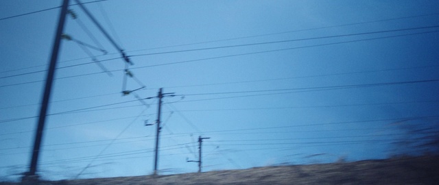 Video Reference: Sky, Electricity, Slope, Tower, Overhead power line, Transmission tower, Atmospheric phenomenon, Electrical wiring, Parallel, Electrical supply