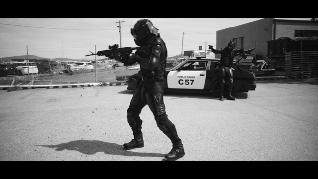 Video Reference: Tire, Vehicle, Car, Wheel, Gesture, Style, Black-and-white, Security, Sky, Military person