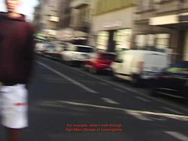 Video Reference: Automotive lighting, Road surface, Asphalt, Motor vehicle, Road, City, Tints and shades, Street fashion, Sidewalk, Lane