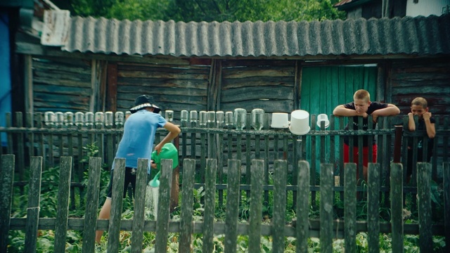 Video Reference: Shorts, Fence, Plant, Grass, Leisure, Wood, Home fencing, T-shirt, Recreation, Tree