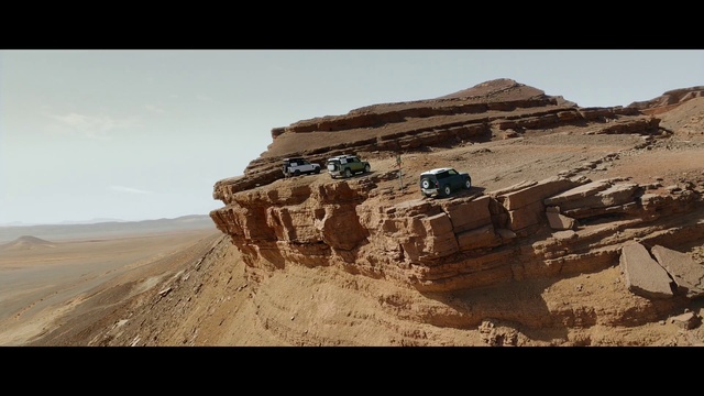 Video Reference: Sky, Mountain, Vehicle, Bedrock, Slope, Terrain, Travel, Landscape, Mountainous landforms, Road