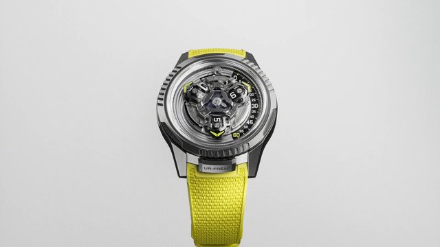 Video Reference: wristwatch, luxury watch, product shot, yellow strap, timepiece, isolated, studio background, close-up, mechanical watch, fashion accessory, metal case, minimal background