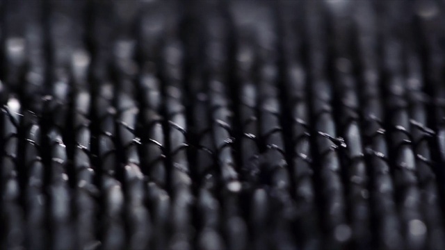 Video Reference: Grey, Font, Mesh, Audio equipment, Gas, Pattern, Technology, Electric blue, Metal, Darkness