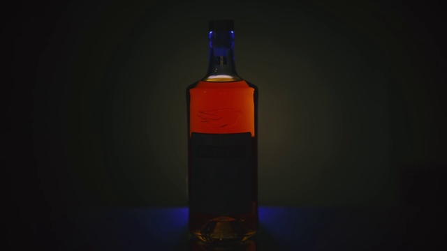 Video Reference: Liquid, Bottle, Drinkware, Glass bottle, Fluid, Amber, Alcoholic beverage, Bottle stopper & saver, Drink, Wine bottle