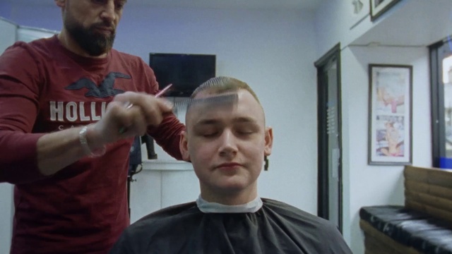 Video Reference: Forehead, Chin, Beauty salon, Hairstyle, Shoulder, Picture frame, Barber, Eyebrow, Mouth, Jaw