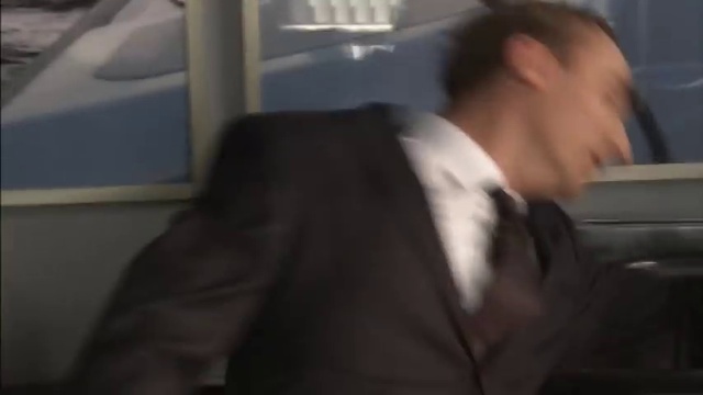 Video Reference: Gesture, Vehicle, Collar, Automotive design, Blazer, Vehicle door, Automotive exterior, Suit, Dress shirt, Formal wear