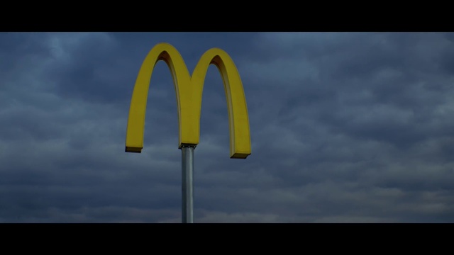 Video Reference: Cloud, Sky, Rectangle, Asphalt, Tints and shades, Font, Landscape, Pole, Arch, Circle