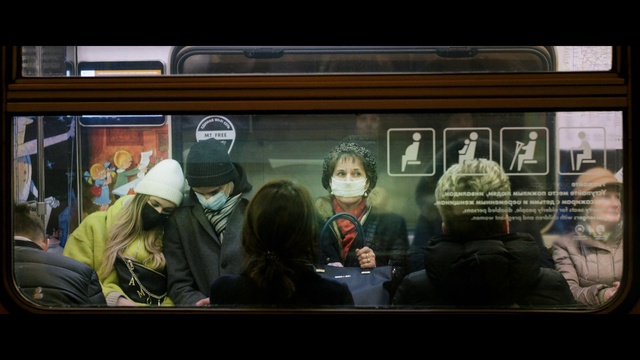 Video Reference: Train, Headgear, Cool, Window, Jacket, Passenger, Public transport, Motor vehicle, Font, Electronic device