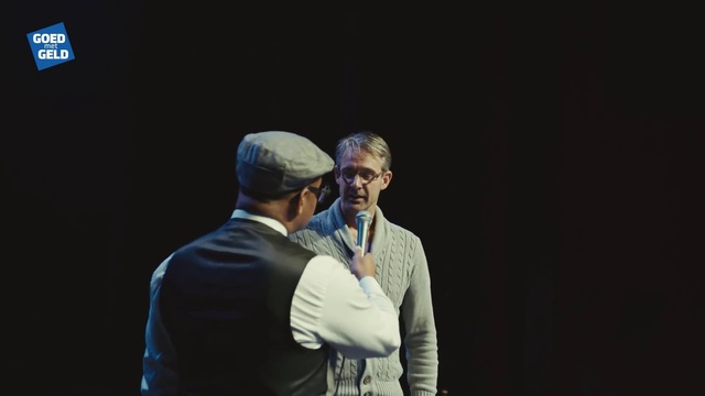 Video Reference: Shirt, Coat, Gesture, Interaction, Entertainment, Cap, Performing arts, Event, Conversation, Electric blue