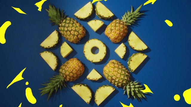 Video Reference: pineapple, fruit, slices, overhead view, blue background, symmetry, arrangement, food styling, tropical, fresh, whole fruit, yellow accents