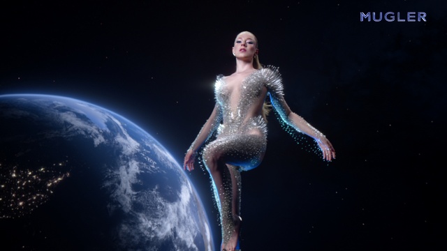 Video Reference: Arm, Human body, Flash photography, Entertainment, Performing arts, Thigh, Electric blue, Event, Art, Astronomical object