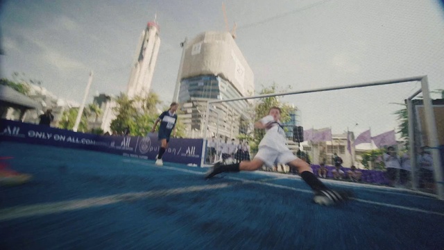 Video Reference: Sky, Building, Tree, Kickflip, Skyscraper, Rolling, Asphalt, Sports equipment, Leisure, City