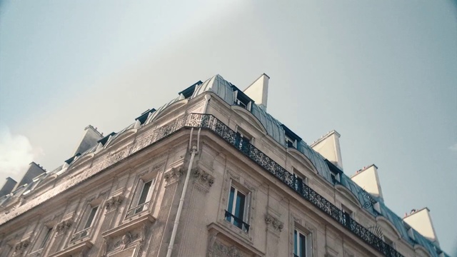 Video Reference: Sky, Building, Window, House, City, Roof, Metropolitan area, Facade, Tree, Metropolis