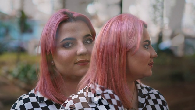 Video Reference: Face, Hair, Lip, Hairstyle, Facial expression, Eyelash, Street fashion, Human, Lipstick, Smile