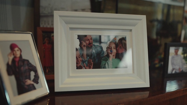 Video Reference: Picture frame, Wood, Smile, Art, Rectangle, People, Beauty, Event, Visual arts, Exhibition