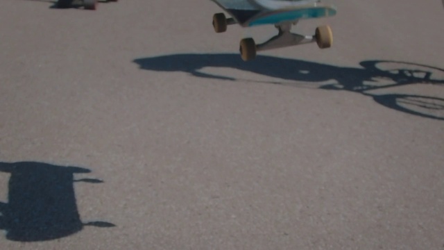 Video Reference: Asphalt, Road surface, Wheel, Rolling, Skateboard, Tar, Vehicle, Aircraft, Tire, Electric blue