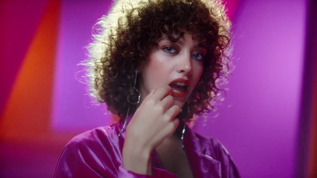Video Reference: Lip, Chin, Hand, Eyebrow, Eye, Eyelash, Jheri curl, Purple, Flash photography, Fashion