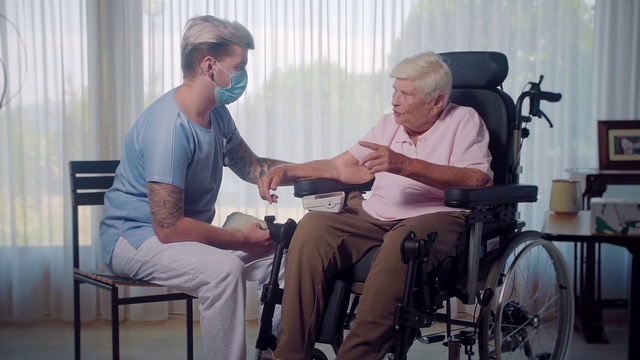 Video Reference: Wheel, Wheelchair, Tire, Muscle, Chair, Medical equipment, Comfort, Bicycle wheel, Curtain, People