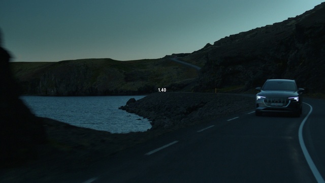 Video Reference: Water, Sky, Car, Mountain, Vehicle, Automotive lighting, Asphalt, Road surface, Motor vehicle, Automotive exterior