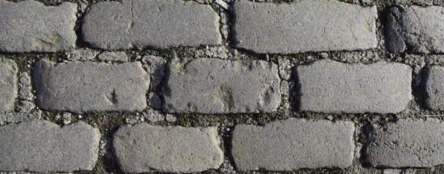 Video Reference: Road surface, Asphalt, Rectangle, Grey, Brick, Grass, Brickwork, Building material, Sidewalk, Composite material