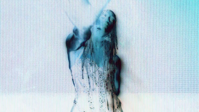 Video Reference: Azure, Textile, Gesture, Art, Font, Electric blue, Pattern, Visual arts, Glass, Shadow