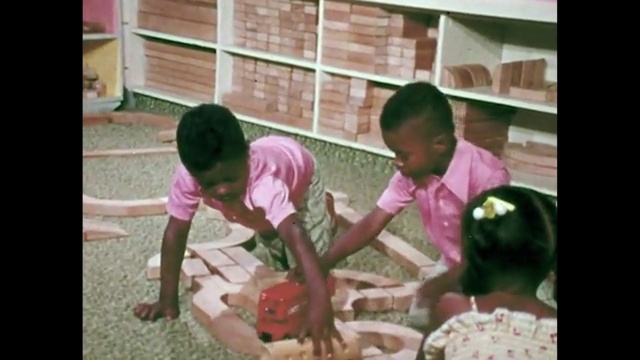 Video Reference: Shirt, Organism, Sharing, Pink, Adaptation, Happy, T-shirt, Event, Child, Font