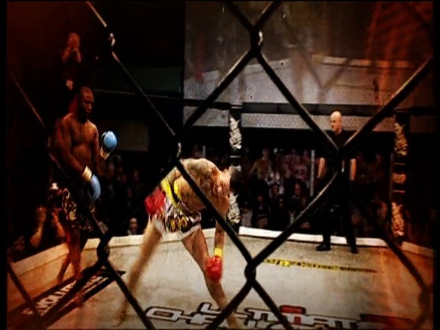 Video Reference: Shorts, Wrestling, Striking combat sports, Duel, Combat sport, Entertainment, Contact sport, Wrestler, Boxing ring, Competition event