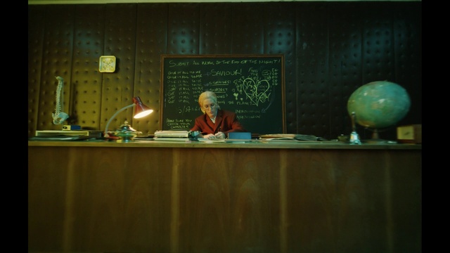 Video Reference: World, Event, Handwriting, Chair, Wood, Picture frame, Room, Visual arts, Blackboard, Art