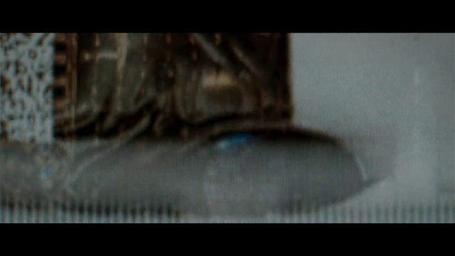 Video Reference: Eyelash, Automotive tire, Grey, Wood, Font, Bumper, Darkness, Automotive exterior, Rim, Eyewear