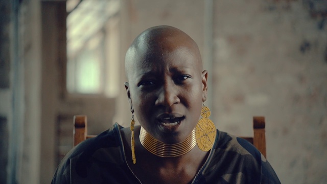 Video Reference: Forehead, Neck, Street fashion, Event, Jewellery, Necklace, Monk, Buzz cut, Lama, Crew cut