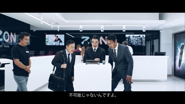 Video Reference: Automotive design, Smile, Gadget, Blazer, Suit, Formal wear, Display device, White-collar worker, Event, Electronic device