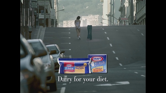 Video Reference: Building, Road surface, Asphalt, Motor vehicle, Automotive lighting, Art, Font, City, Sidewalk, Automotive design